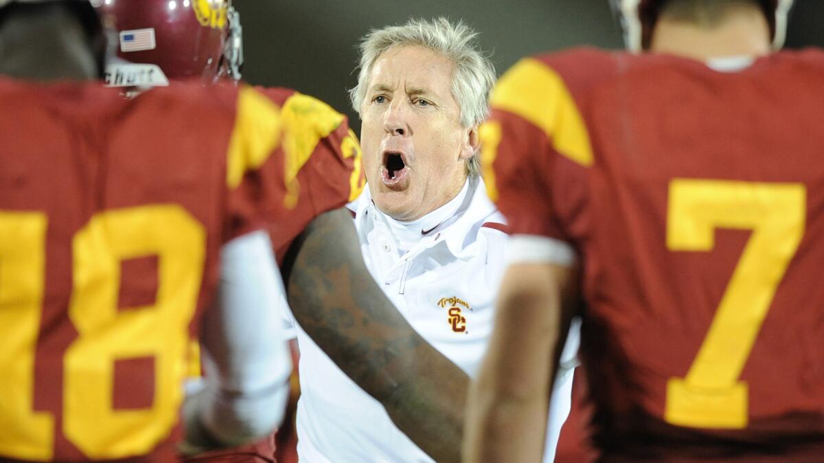 USC Coach Pete Carroll celebrates a touchdown against UCLA in November 2009.
