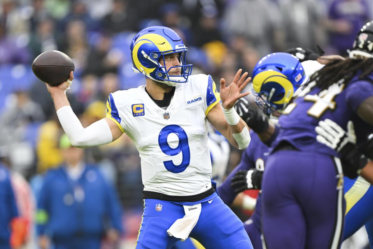  Rams quarterback Matthew Stafford (9) throws against the Ravens.