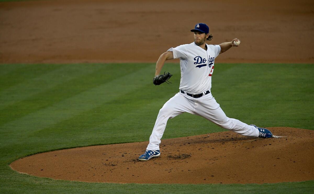 Dodgers starter Clayton Kershaw delivers a pitch during the second inning of Tuesday's game against the Angels.