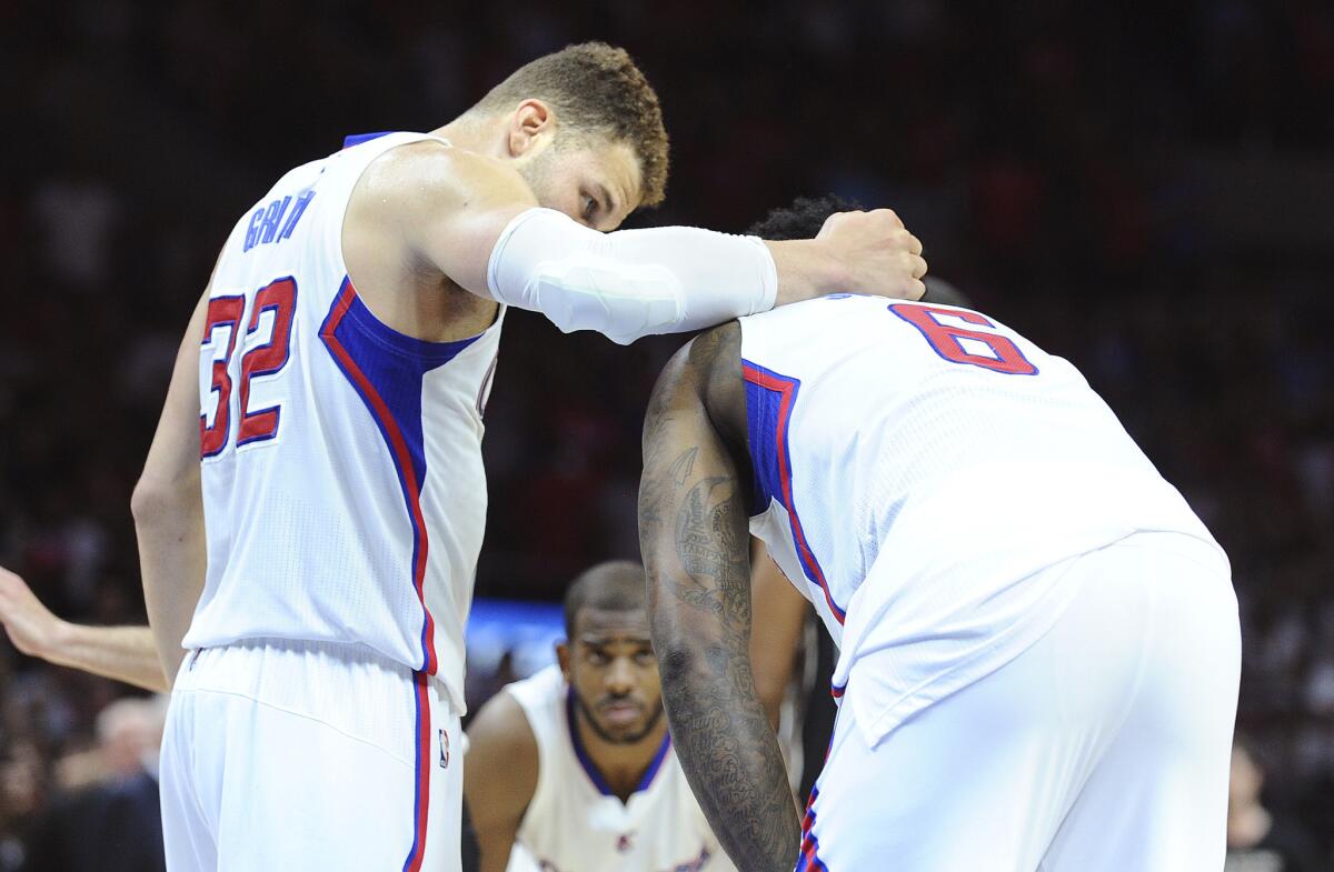 Blake Griffin consoles DeAndre Jordan after getting called for basket interference late in the fourth quarter of the Clippers' loss to the San Antonio Spurs, 111-107, in Game 5 of the playoff series.
