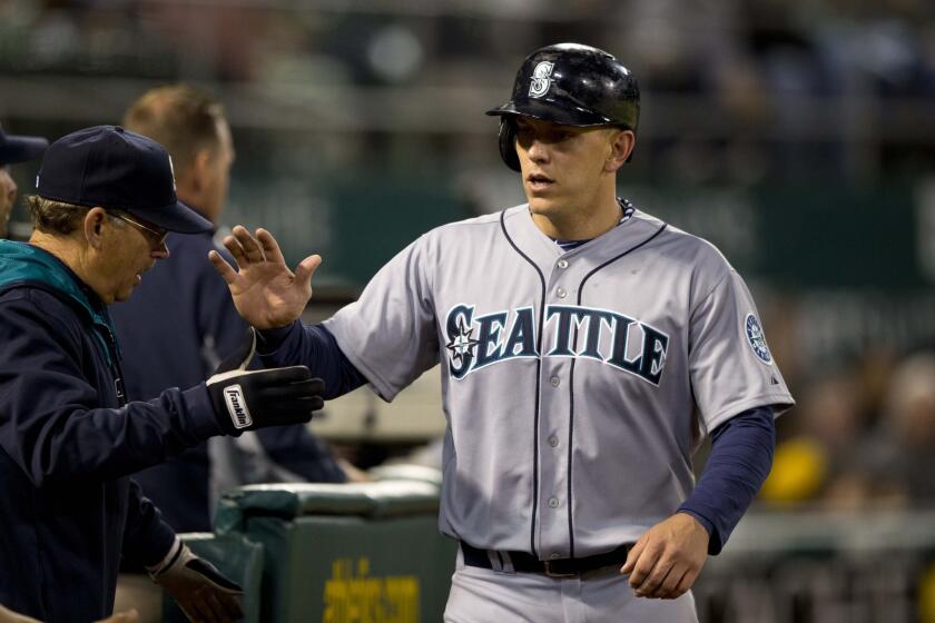 Seattle put outfielder Logan Morrison on the 15-day disabled list on Wednesday because of a strained right hamstring.