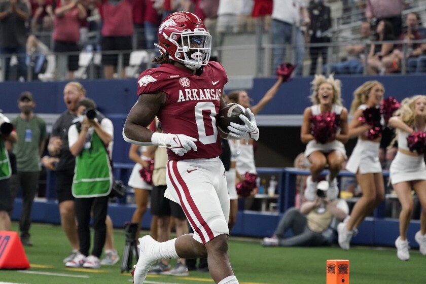 Arkansas running back AJ Green scores a touchdown in the first half Sept. 25, 2021.