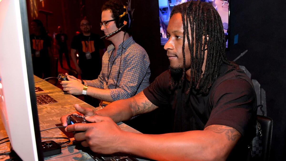 Rams star Todd Gurley participates in the "Call of Duty: Black Ops 4" community reveal event in Hawthorne on May 17, 2018.