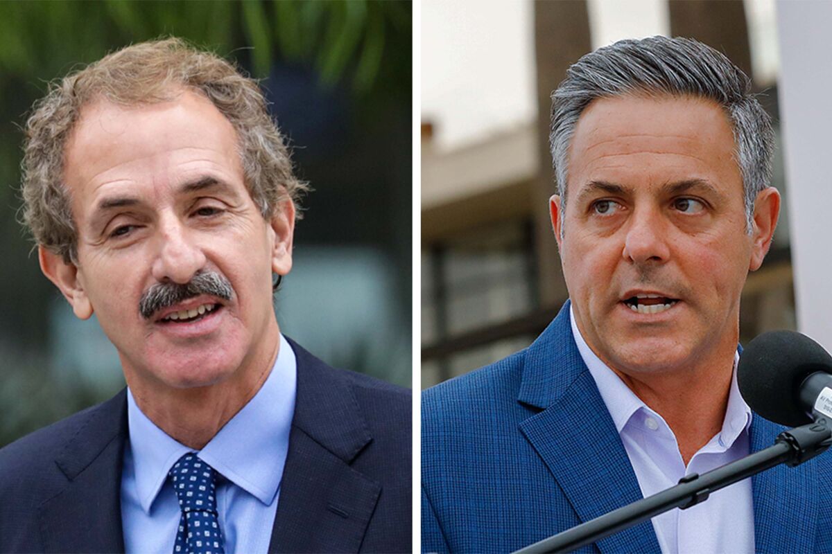 City Atty. Mike Feuer and Councilman Joe Buscaino.
