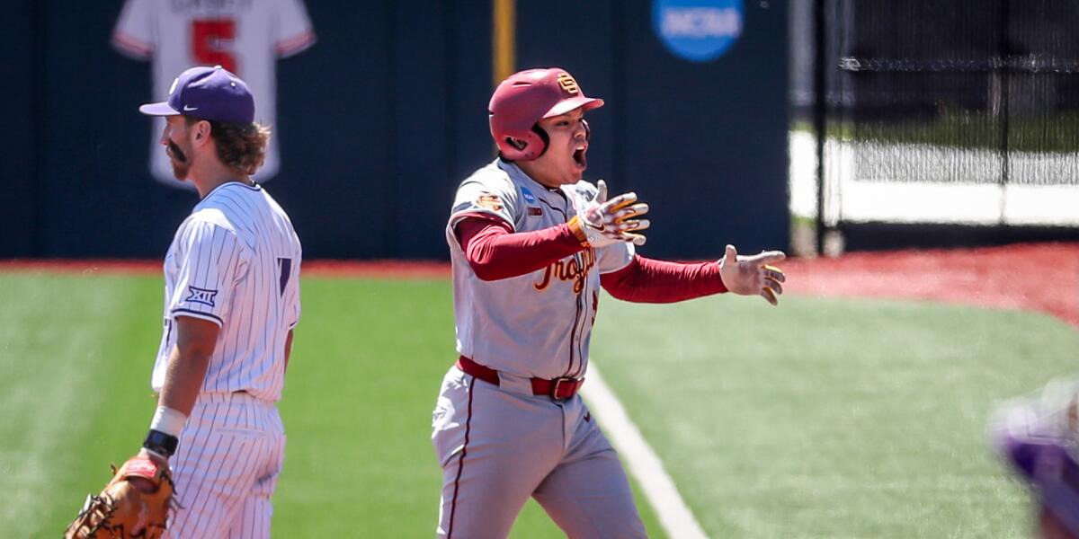 USC's Richard Tejada celebrates after driving in a run against Texas Christian in the NCAA baseball tournament regional.