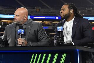 Andrew Whitworth (left) and Richard Sherman at analysts desk for NFL Thursday night football.