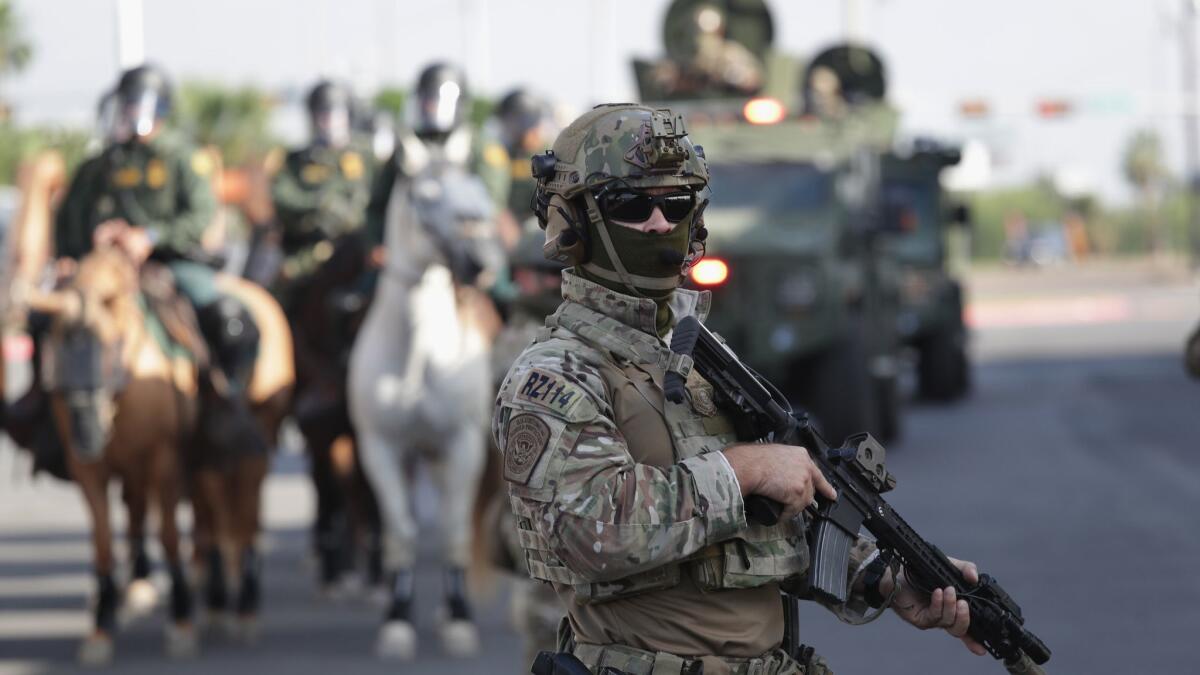 U.S. Customs and Border Protection agents take part in a training exercise Monday at the U.S.-Mexico border in Hidalgo, Texas.