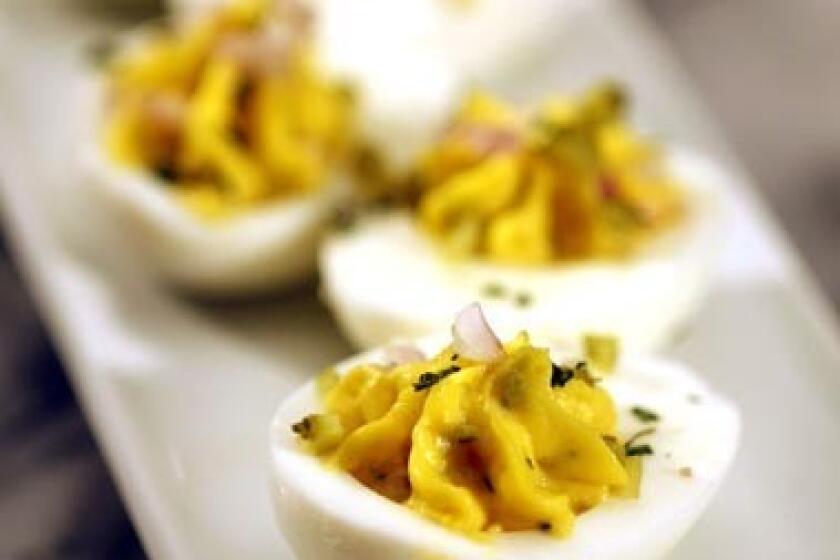 Deviled eggs with tarragon and cornichons is a kind of inside-out variation on sauce gribiche.