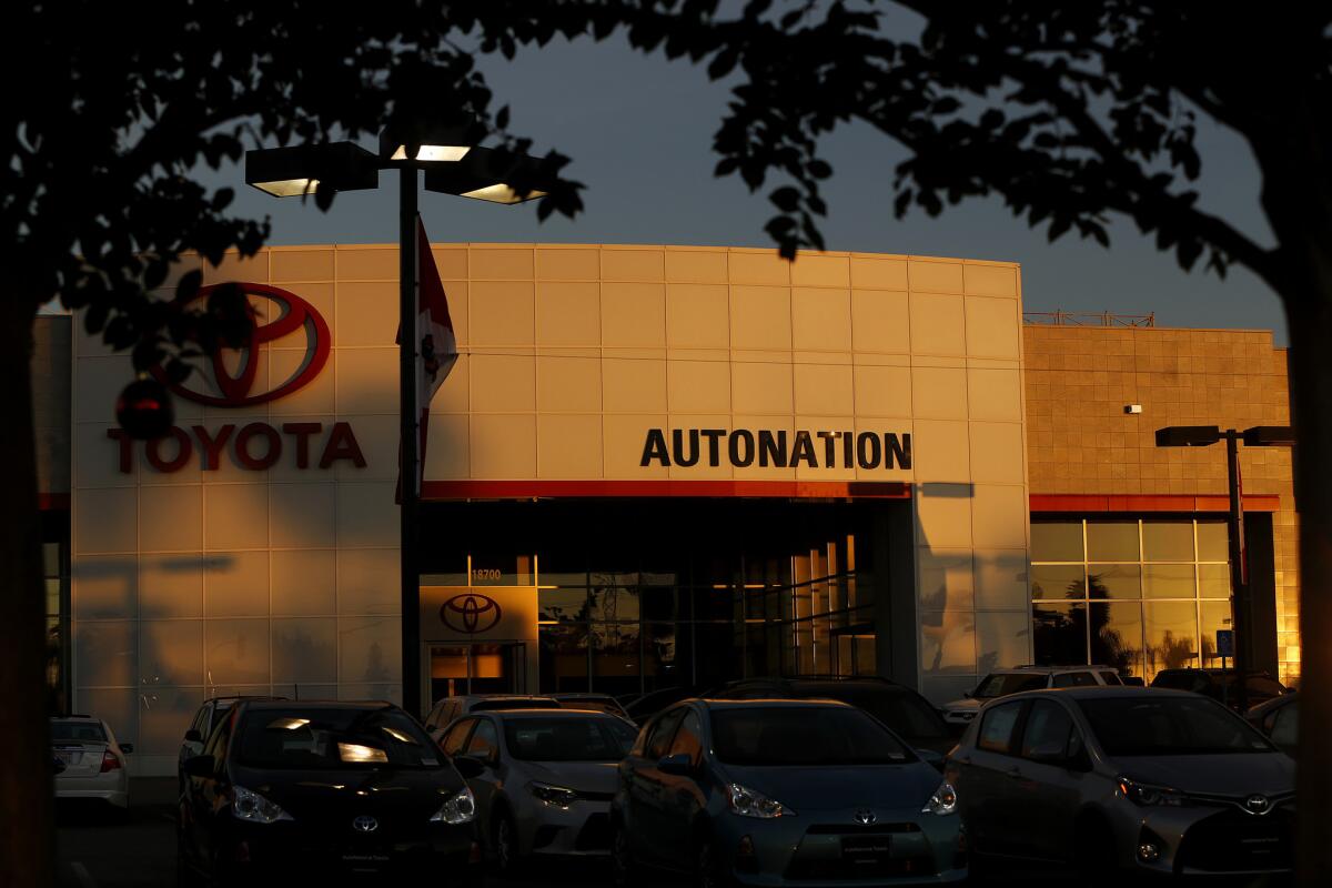 New cars sit on the lot at AutoNation Toyota Cerritos on Dec. 8, 2014.