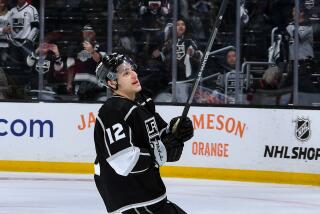 The Kings' Trevor Moore celebrates after L.A.'s 3-2 overtime victory over Edmonton in Game 3 on April 21, 2023.