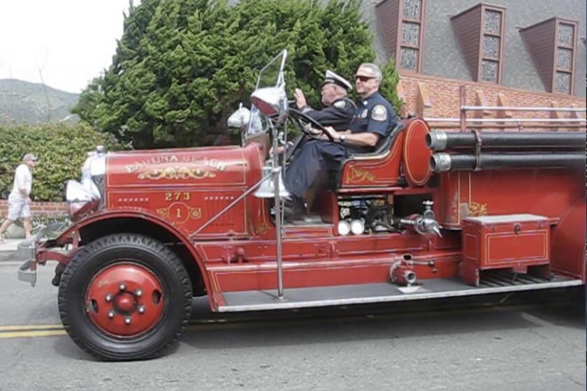 The Laguna Beach fire department's 1931 Seagrave fire engine, participates in the 2017 Patriots Day Parade.