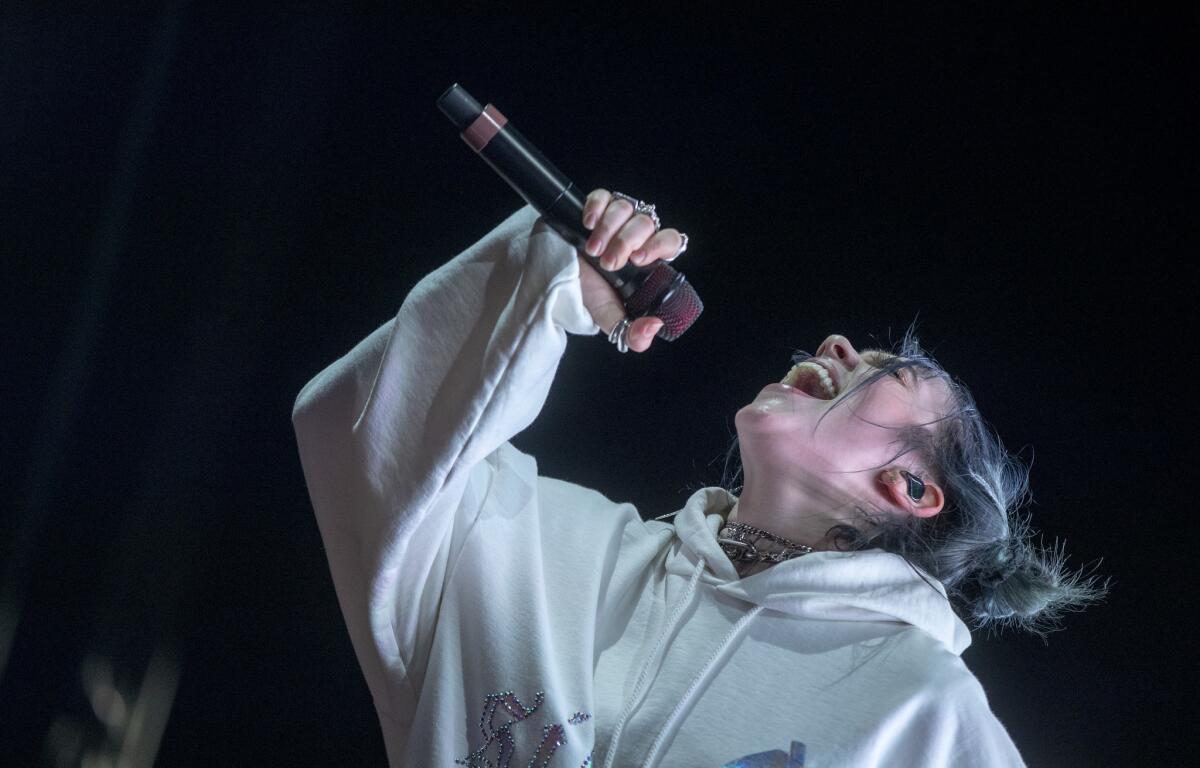 Billie Eilish on stage at the Coachella Valley Music and Arts Festival. (Brian van der Brug / Los Angeles Times)