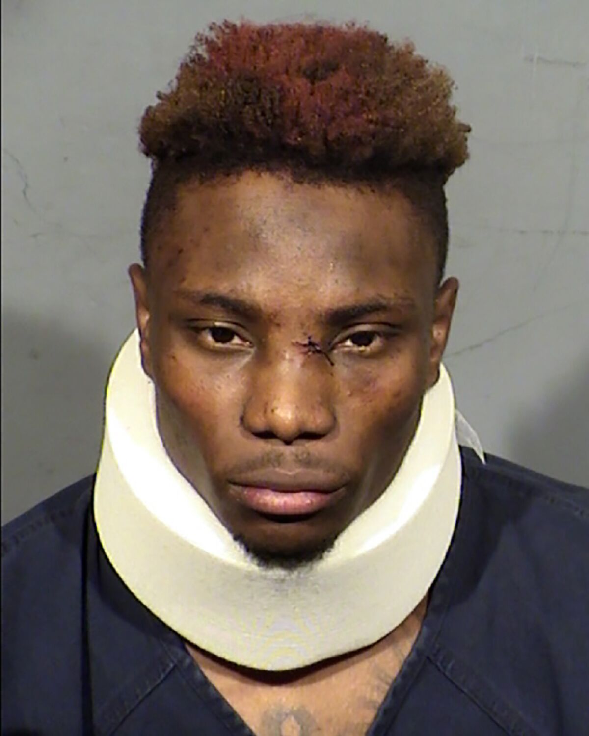 FILE - This booking photo provided by Las Vegas Metropolitan Police Department shows former Las Vegas Raiders wide receiver Henry Ruggs III following his arrest Tuesday, Nov. 2, 2021. Ruggs' lawyers are asking a judge to throw out evidence that prosecutors say shows Ruggs had a blood-alcohol level twice legal limit while speeding at 156 mph before a fiery crash that killed a woman last November. (Clark County Detention Center via AP, File)