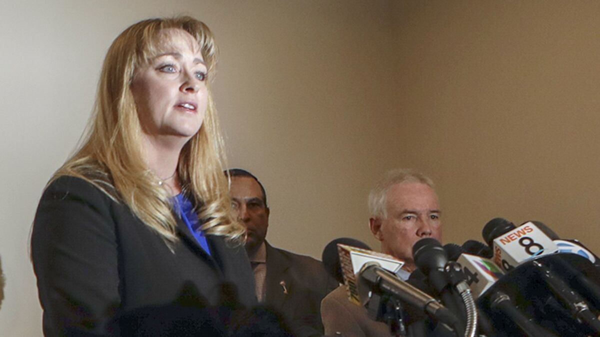 Susan von Zabern, then-director of the Riverside County Department of Public Social Services, speaks at a January news conference on the child abuse investigation of Perris couple David and Louise Turpin.