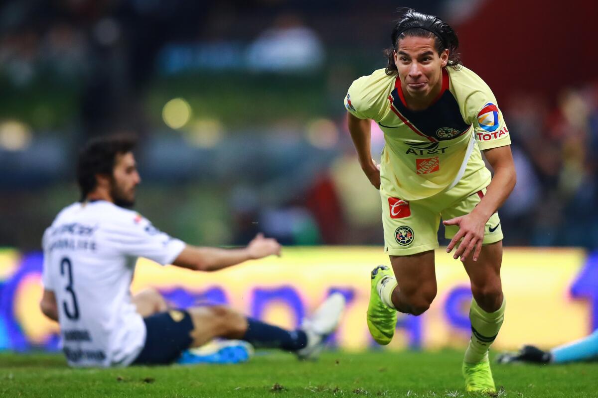 Diego Lainez #20 of America celebrates after scoring the 5th goal of his team during the semifinal second leg match between America and Pumas UNAM as part of the Torneo Apertura 2018 Liga MX at Azteca Stadium on December 9, 2018 in Mexico City, Mexico.