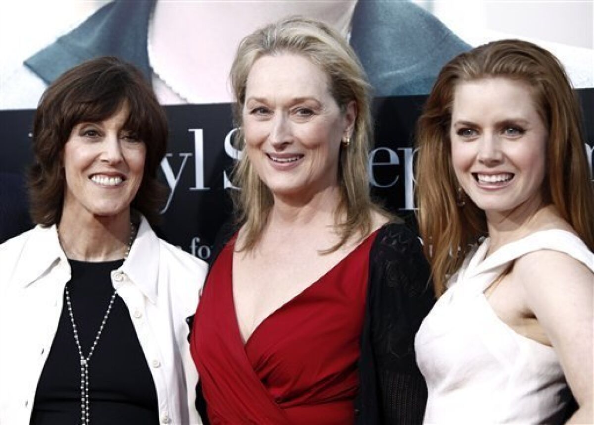 FILE - This July 27, 2009 file photo shows director and writer Nora Ephron, left, and cast members Meryl Streep, center, and Amy Adams pose together at the premiere of "Julie and Julia" in Los Angeles. Publisher Alfred A. Knopf confirmed Tuesday, June 26, 2012, that author and filmmaker Nora Ephron died Tuesday of leukemia in New York. She was 71. (AP Photo/Matt Sayles, file)