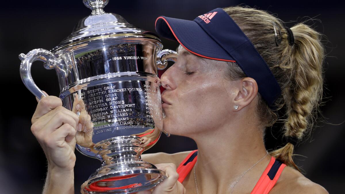 Angelique Kerber celebrates after winning the U.S. Open championship on Saturday.