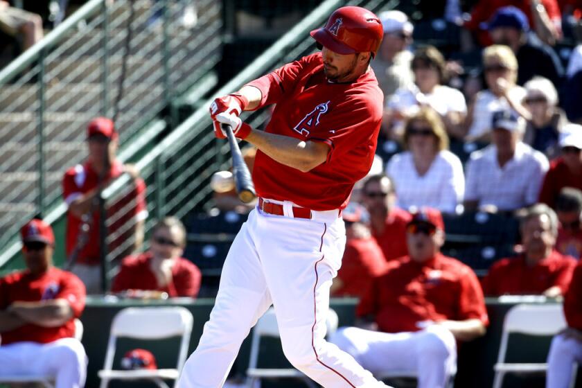 Angels outfielder Matt Joyce hits during a spring training baseball game in March.