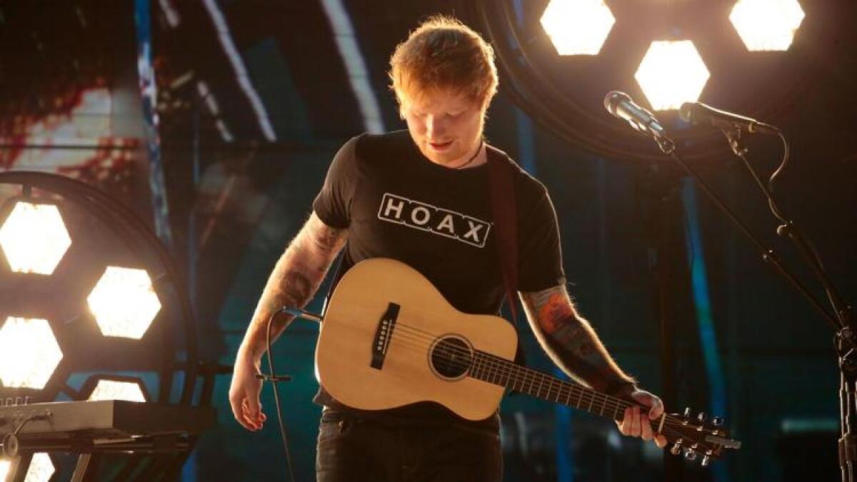 Ed Sheeran, shown performing at the Grammy Awards in Los Angeles in February, will guest in an upcoming episode of "The Simpsons."