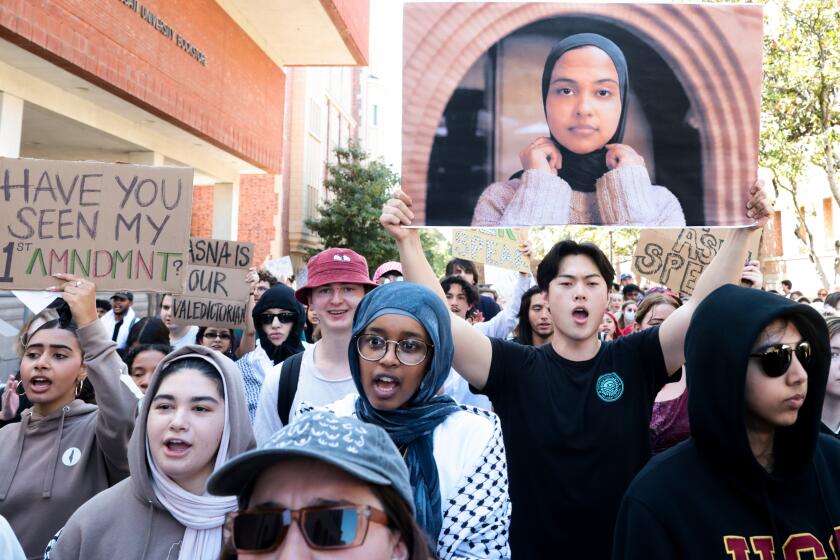 Los Angeles, California - April 18: USC students participate in a silent march in support of Asna Tabassum, whose graduation speech has been cancelled by USC administration at University of Southern California on Thursday, April 18, 2024 in Los Angeles, California. Asna Tabassum, a graduating senior at USC, was selected as valedictorian and offered a traditional slot to speak at the 2024 graduation. After on-and-off campus groups criticized the decision and the university said it received threats, it pulled her from the graduation speakers schedule.(Wally Skalij / Los Angeles Times)