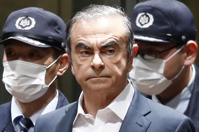 Former Nissan Chairman Carlos Ghosn leaves Tokyo's Detention Center on April 25 after posting bail.