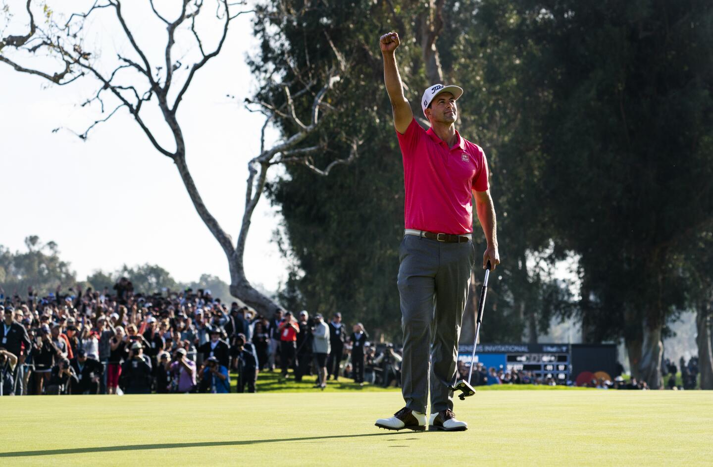 Adam Scott celebrates after winning the Genesis Invitational at Riviera Country Club in Pacific Palisades on Feb. 16, 2020.