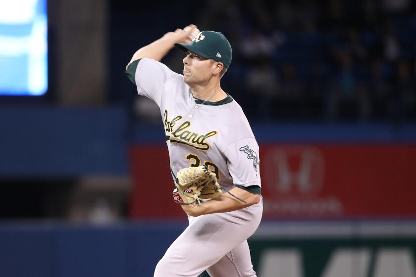 TORONTO, ON - APRIL 28: Blake Treinen #39 of the Oakland Athletics delivers a pitch in the eleventh inning during MLB game action against the Toronto Blue Jays at Rogers Centre on April 28, 2019 in Toronto, Canada. (Photo by Tom Szczerbowski/Getty Images)