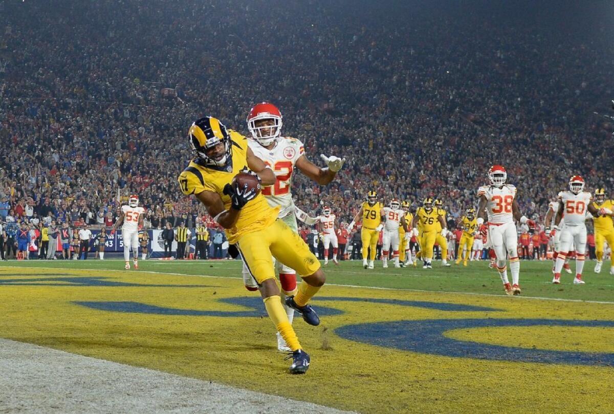 Rams receiver Robert Woods (17) catches a touchdown pass in the first quarter against the Chiefs on Nov. 19.