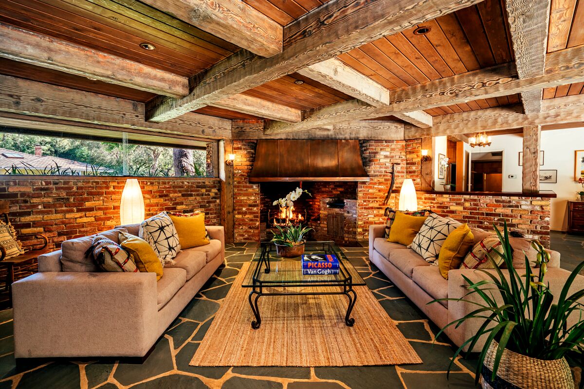 Our Home of the Week is a ranch house in Bel-Air that combines wood, brick and stone.