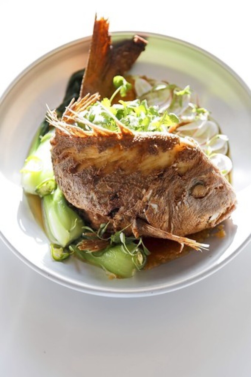 On the "old school" menu at Fishing With Dynamite, a whole New Zealand Thai Snapper for two, with ginger, garlic, kaffir lime and bok choy, for $48.