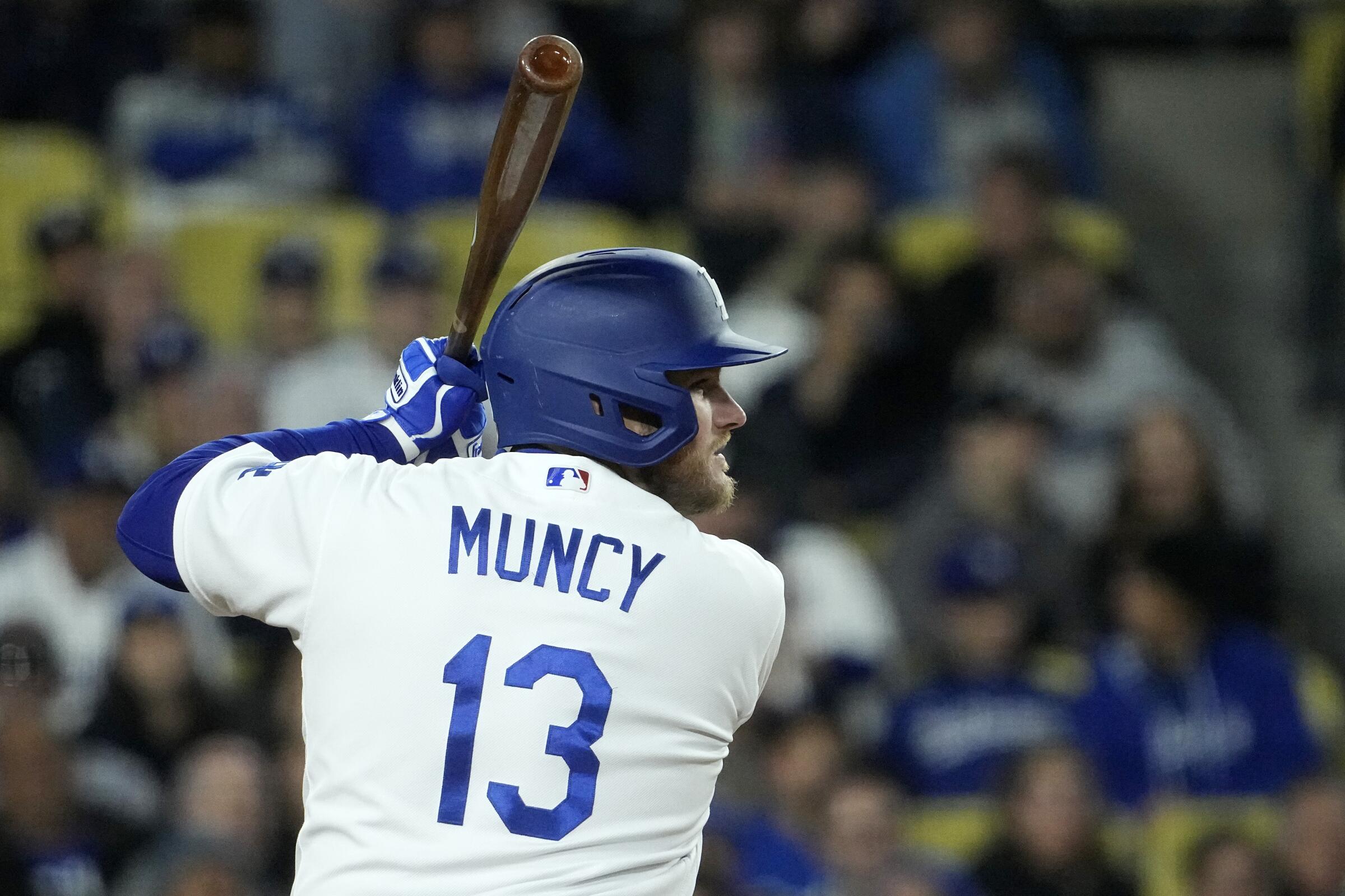 Dodgers third baseman Max Muncy bats during the ninth inning of the Dodgers' loss to the Chicago Cubs.