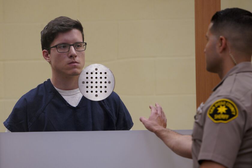 April 30, 2019, San Diego, California John Earnest, 19, accused of killing one and wounding 3 others in the Chabad of Poway shooting on April 27, 2019, appears in San Diego Superior court with his attorney, John O'Connell, public defender during his arraignment before Judge, Joseph P. Brannigan. (Nelvin C. Cepeda / The San Diego Union-Tribune)