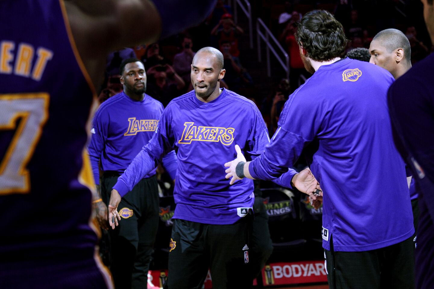 Lakers star Kobe Bryant is introduced for the last time before a game against the Rockets in Houston.