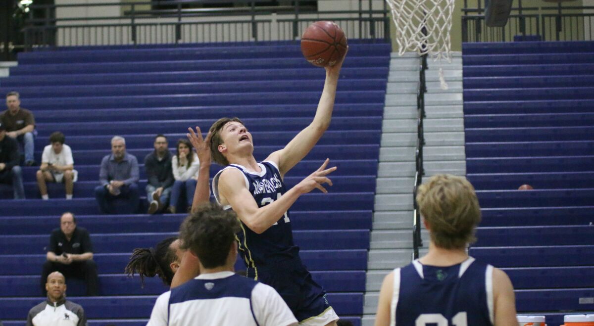 LCC's Tommy Griffitts led the Mavs with 23 pts.