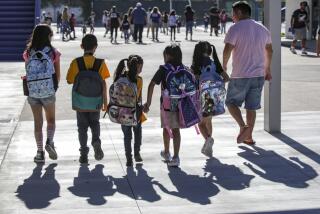 Students with colorful backpacks on first day of school at Sunkist Elementary School on Aug. 11, 2022 in Anaheim.