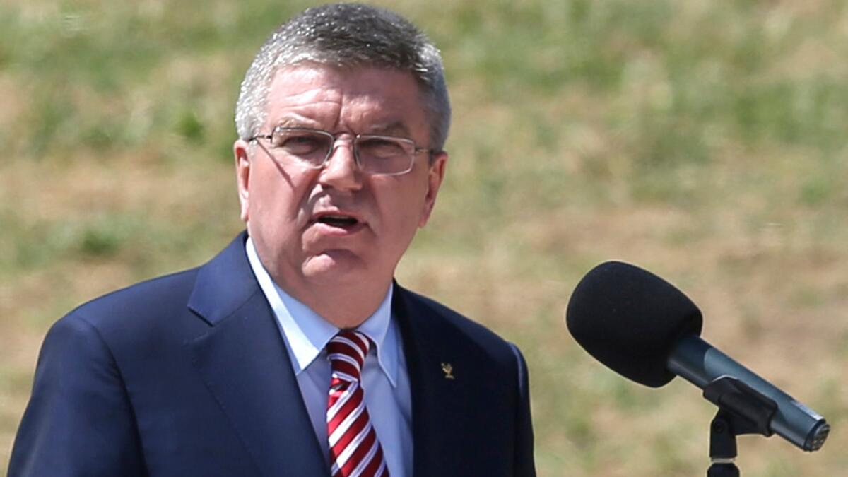 IOC President Thomas Bach speaks April 21 during the ceremonial lighting of the Olympic flame in Ancient Olympia, Greece.