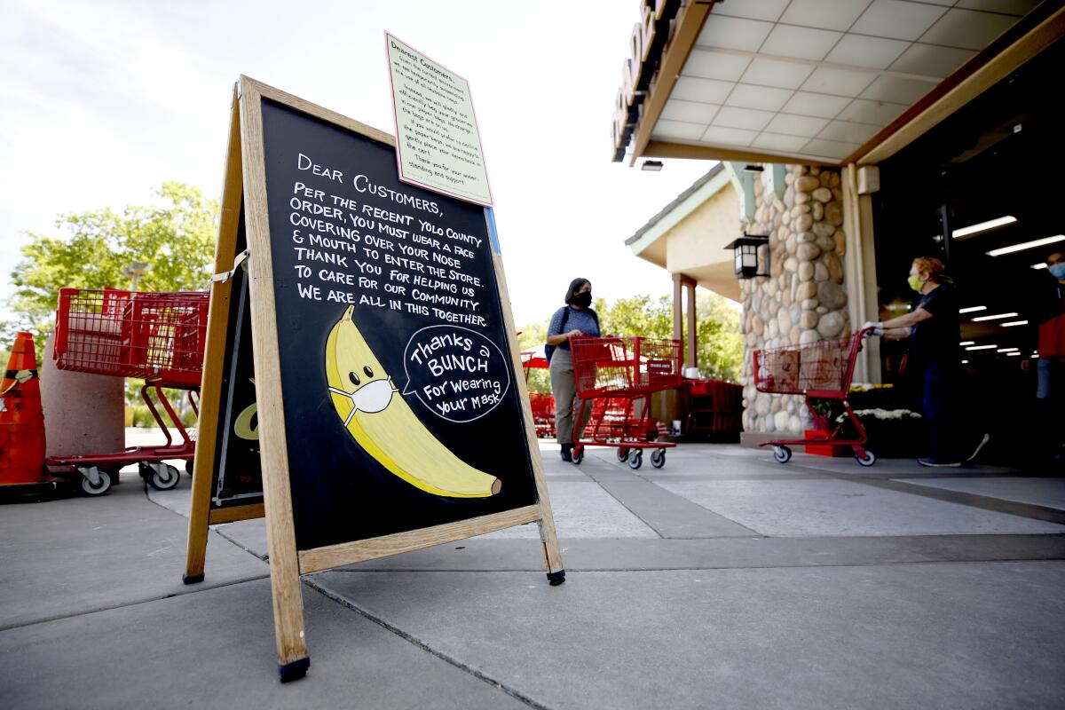 A chalk-written sign outside a market.