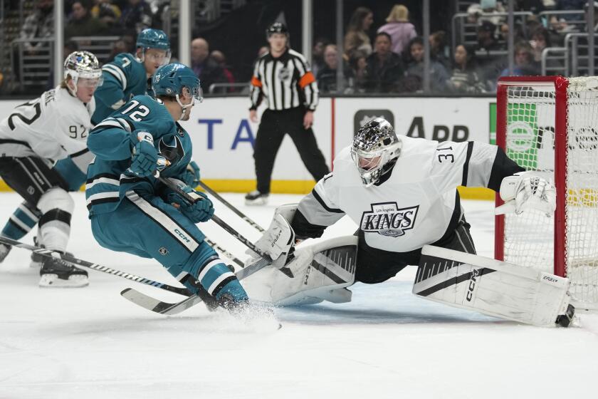 Los Angeles Kings goaltender David Rittich (31) stops a shot by San Jose Sharks.