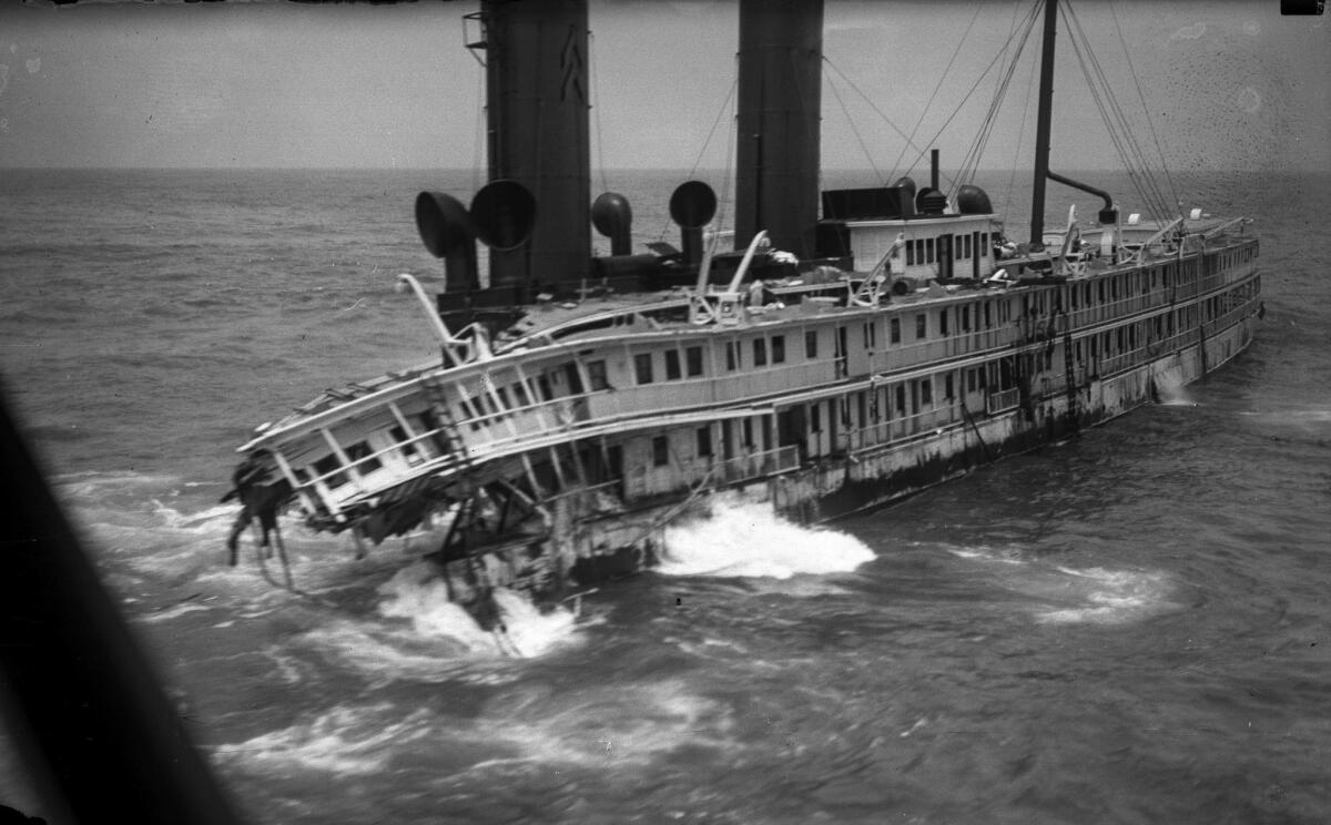 June 12, 1931: Wreck of the Harvard is taken in aerial photo two weeks after the passenger ship ran aground in fog at Point Arguello. The forward third of the ship had already broken off.