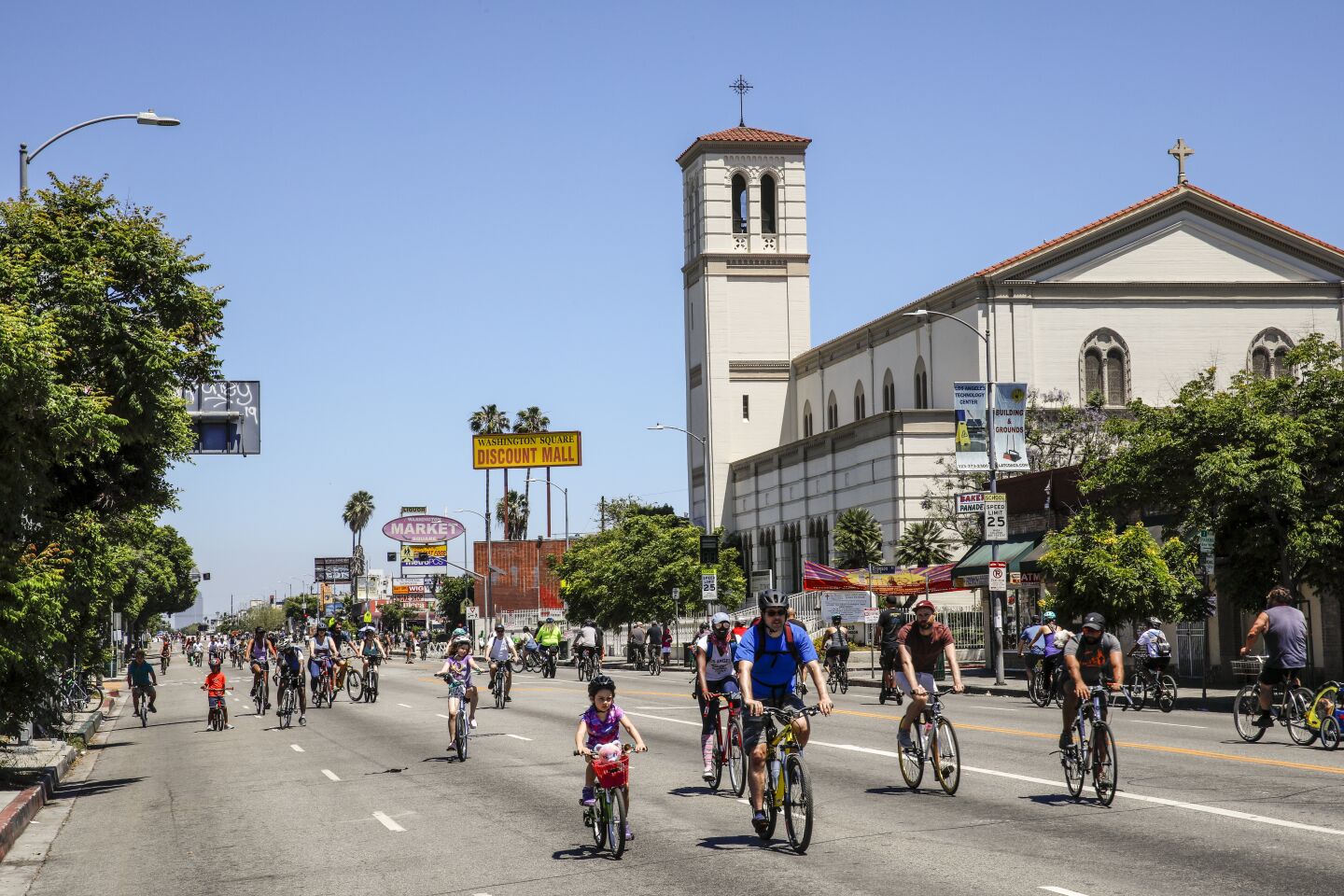 LOS ANGELES, CA--JUNE 30, 2019--The scene along Washington Boulevard, near Crenshaw, during a CicLAvia event in the West Adams neighborhood of Los Angeles, CA, photographed June 30, 2019. (Jay L. Clendenin / Los Angeles Times)