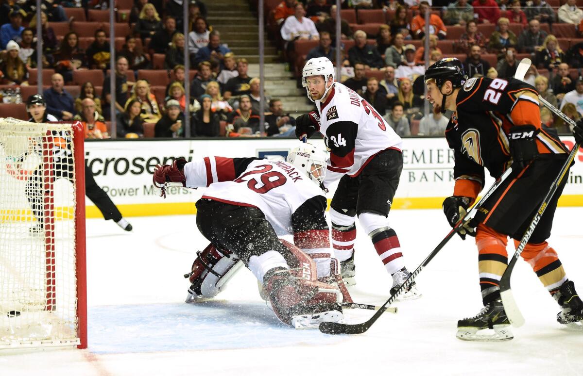Ducks forward Chris Stewart scores a power play goal in front of Coyotes goalie Anders Lindback.
