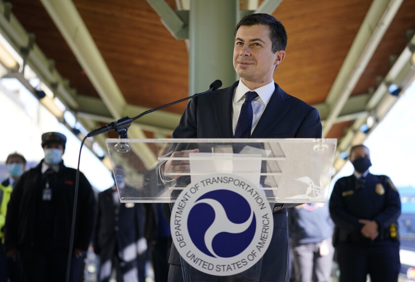 FILE - In this Feb. 5, 2021, file photo Transportation Secretary Pete Buttigieg speaks at Union Station in Washington. Two months into his job, Buttigieg is forging a fresh path for his Cabinet role and in his life that could bridge gaps with Republicans when it comes to President Joe Biden’s agenda. (AP Photo/Carolyn Kaster, File)