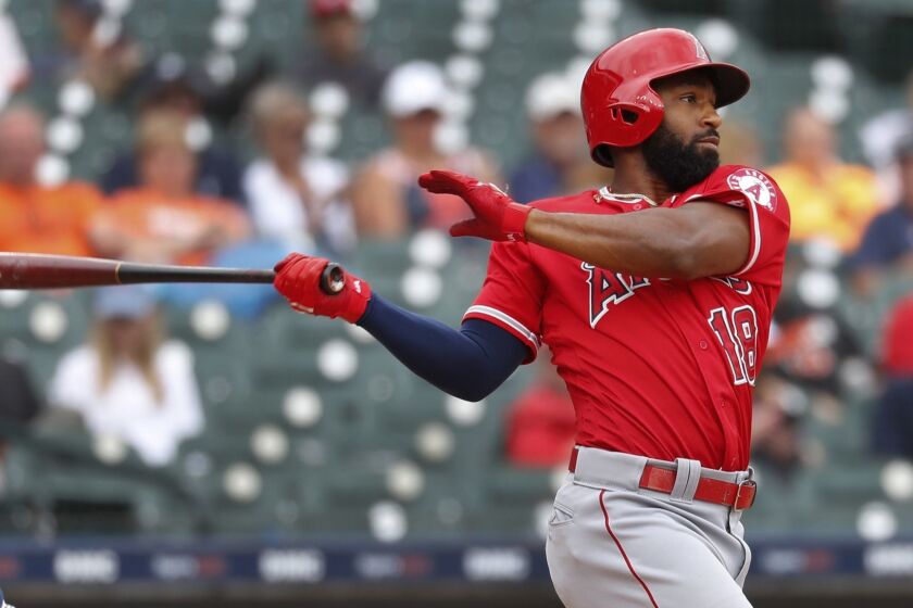 Los Angeles Angels' Brian Goodwin bats against the Detroit Tigers in the eighth inning of a baseball game in Detroit, Thursday, May 9, 2019. (AP Photo/Paul Sancya)