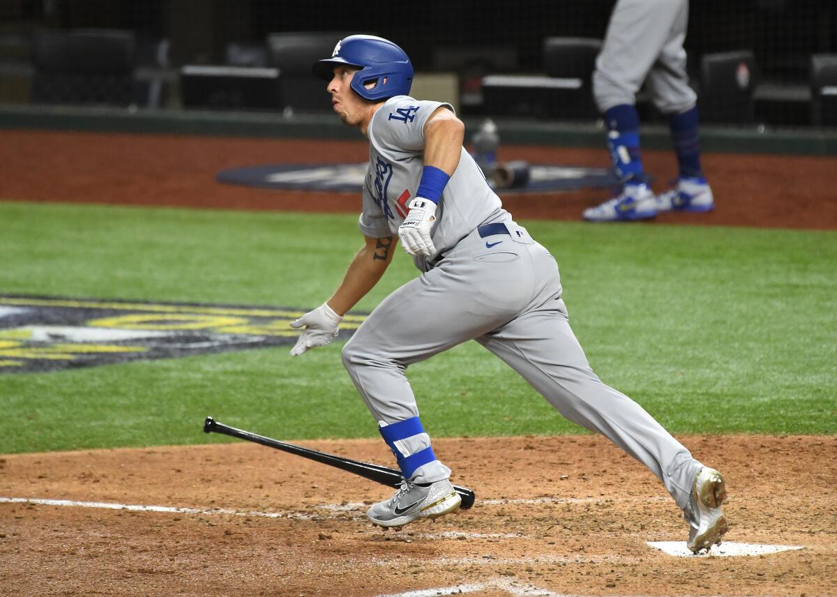 Austin Barnes runs out of the batter's box after hitting a solo home run in the sixth inning Oct. 23, 2020.