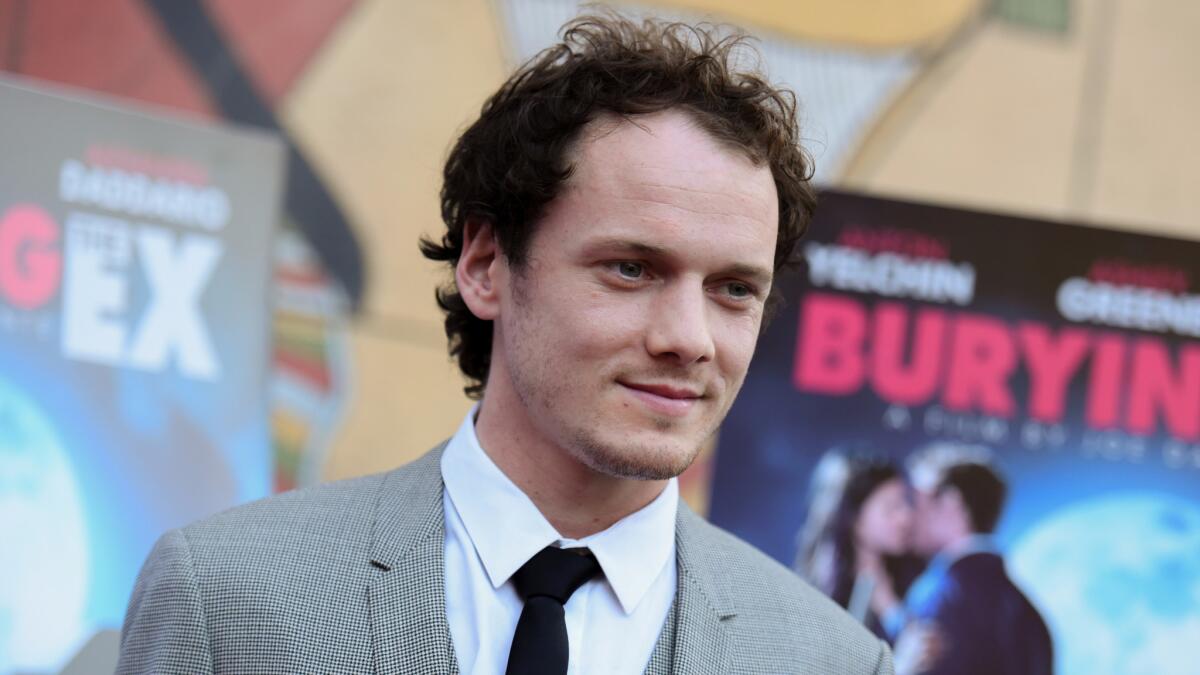 Anton Yelchin arrives at a screening of "Burying the Ex" at Grauman's Egyptian Theatre in Los Angeles.