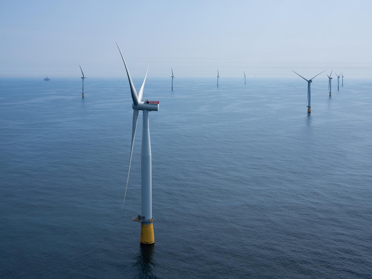 Floating wind turbines are shown in the North Sea. 