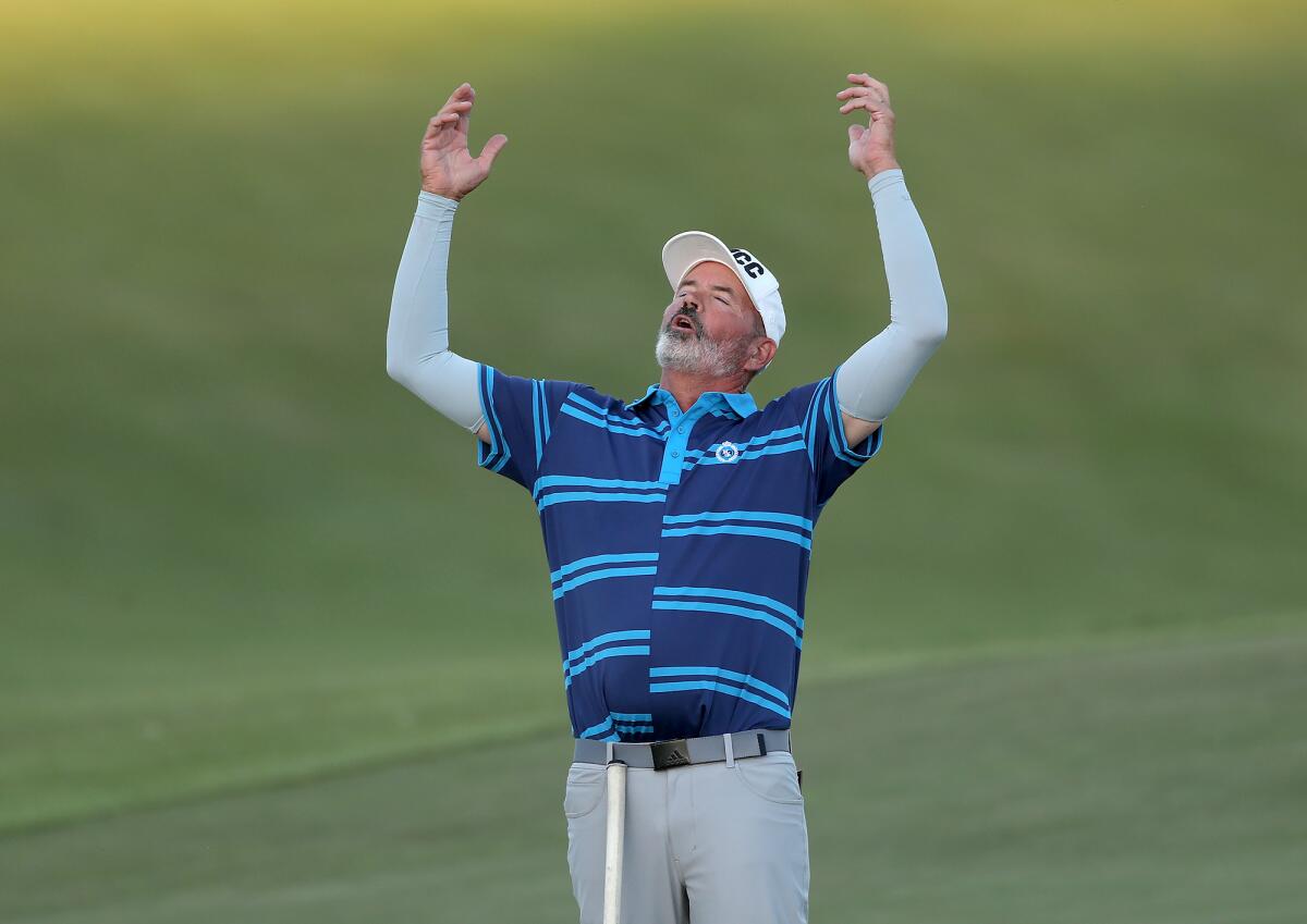 Mike Fergin from Mesa Verde Country Club reacts to missing a long putt on the final hole, during the annual Jones Cup.