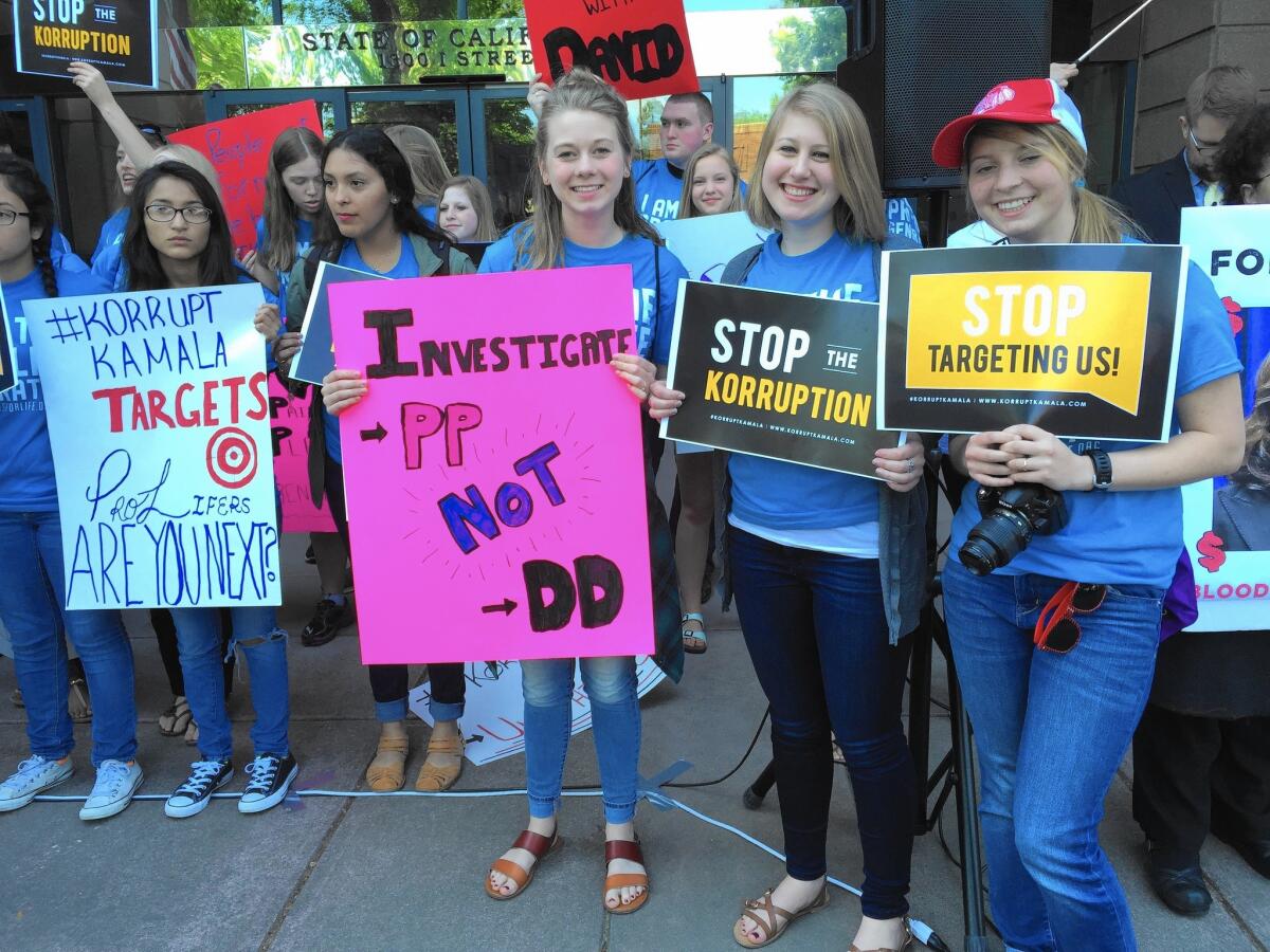 Members of Students for Life protest outside the office of California Atty. Gen. Kamala Harris.