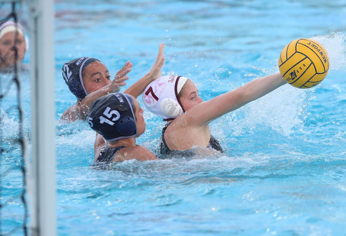 Laguna Beach's Kara Carver shoots a backhand shot for a score.