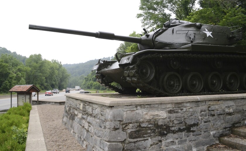 In this June 27, 2013 photo, an old Army tank now stands as a monument near the entrance to Fort Knox, Ky. Military police fatally shot a man who breached the main gate at Kentucky's Fort Knox and tried to run over officers, officials said. The shooting happened early Sunday, Jan. 23, 2022 when the man drove toward Fort Knox police officers after initially fleeing from them through the gate, which is near the U.S. Bullion Depository, news outlets reported citing a statement from the Army post. (AP Photo/Dylan Lovan, file)